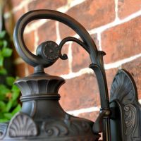 Close up of swan neck and decorative detailing 