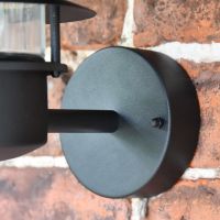 Close up of circular wall mounted bracket
