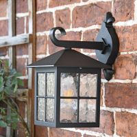 Side view of wall lantern with scroll top bracket 