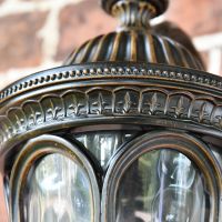 Close up of ornate pattern and embellishment on light