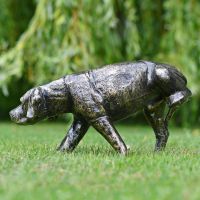 "Taking a leak" Dog Sculpture In Garden Setting