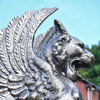 Profile view of Sculpture head and wings 
