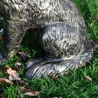 Close up of etching on hind legs and tail 