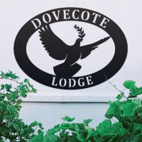 Dove Design on Oval House Name Sign 