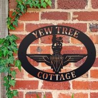 British Parachute Regiment Iron Oval House Sign on a Brick Wall