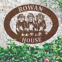 "See No Evil, Hear No , Speak No Evil" Iron Oval House Sign in situ in a Stone Wall