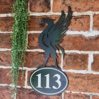 Black Liver Bird Iron House Number Sign in Situ