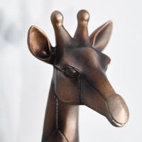 Close up of giraffe head including horns and ears 