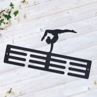 Female Gymnast on Medal Holder 