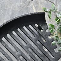 Close up of curved fire grate 