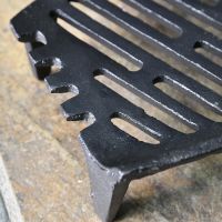 Close up of corner on curved fire grate 