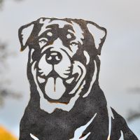Close up of cut out detailing on unfinished metal silhouette 