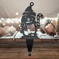 Candy Cane in Hand of Penguin Stocking Holder 