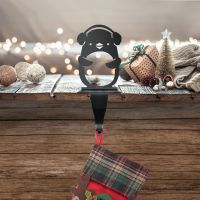 Penguin in earmuffs stocking holder 