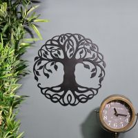 Tree of Life Wall Art on Blue Wall beside Plant & Clock