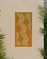 Rustic "Geometric Cube Wall Art" on a beige outdoor wall surrounded by palm leaves
