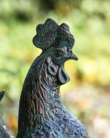 Close up of Verdigris rooster"s head