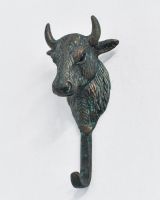 Front view of verdigris bull head coat hook