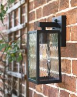 View of the Side of the Oakley Top Fix Wall Light Mounted on a Brick Wall