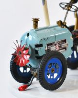 Close up of Vintage Farmer Recycled Metal Sculpture Bonnet