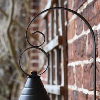 Close-up of the Curved Bracket on the Vintage Round Caged Wall Lantern