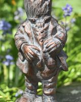 Close up of clothes detail on animal garden statue