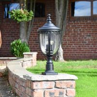 "Winsford" Black Traditional Countryside Pillar Light in Situ on a Brick Wall