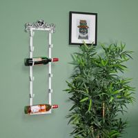 Wall Mounted Heart Wine Rack in Situ on Blue Wall