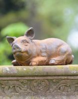 Cast Iron Resting Pig Sculpture