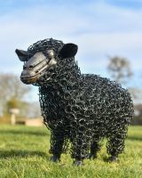 Full body shot of the Rustic Bed Spring Sheep Sculpture Black 