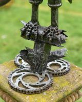 Close up of feet detail on scrap metal art sculpture