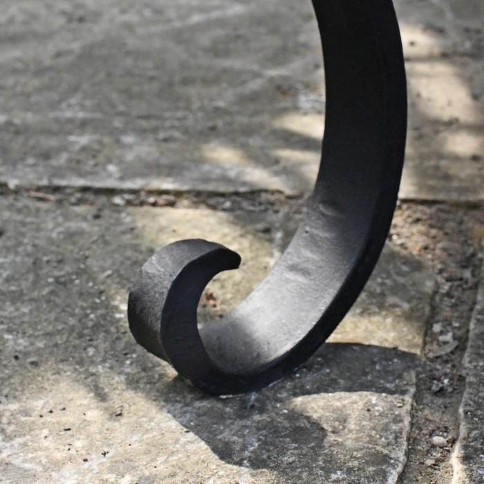 Close-up of the Curled Feet on the Kadai Bowl