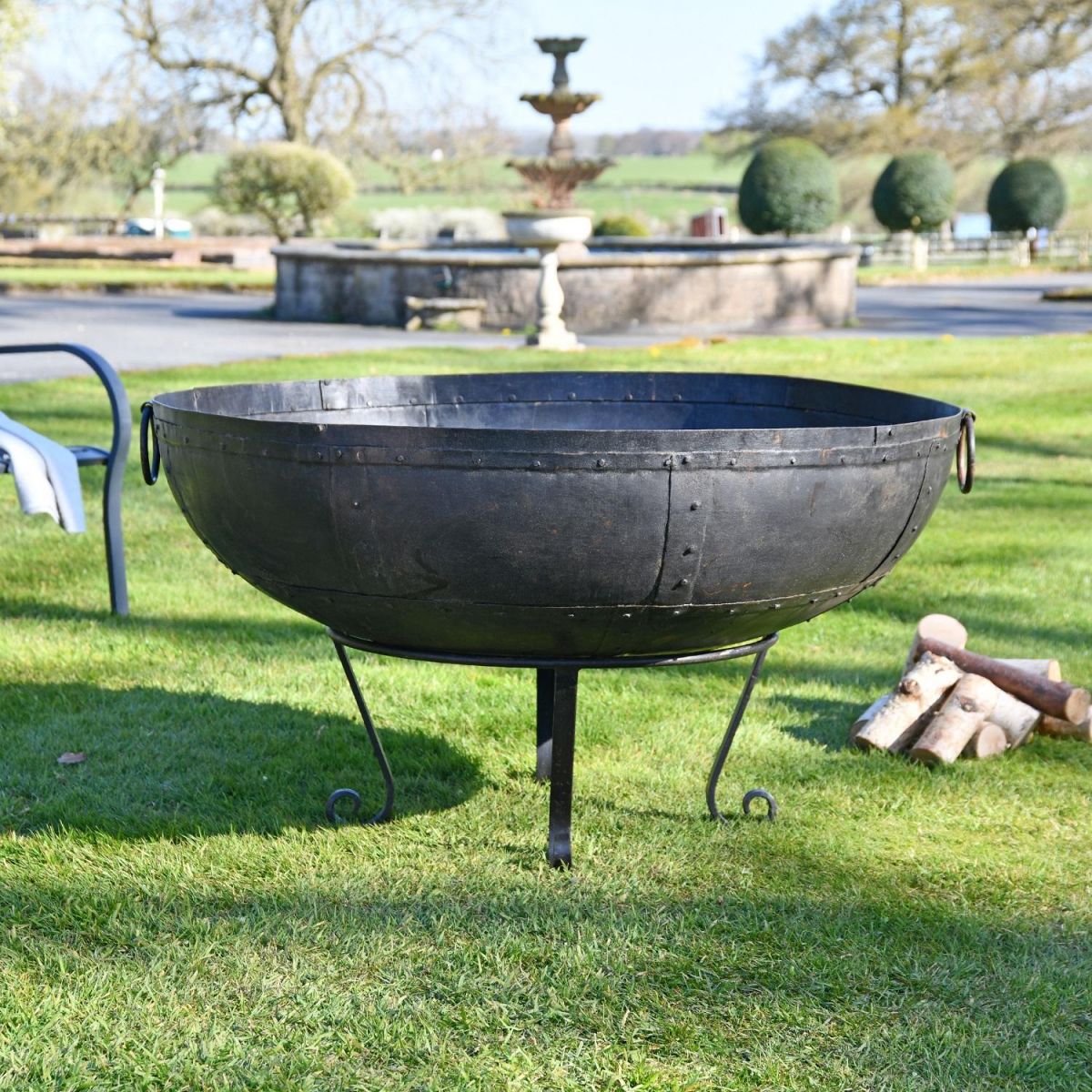 Traditional Iron Kadai Bowl in Garden Area 