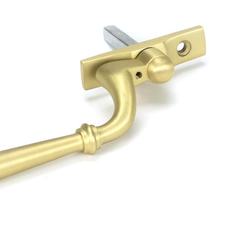 Close-Up of 16mm Modern Satin Brass Espagnolette Window Handle - Right Hand Close-Up of 16mm Modern Satin Brass Espagnolette Window Handle - Right Hand