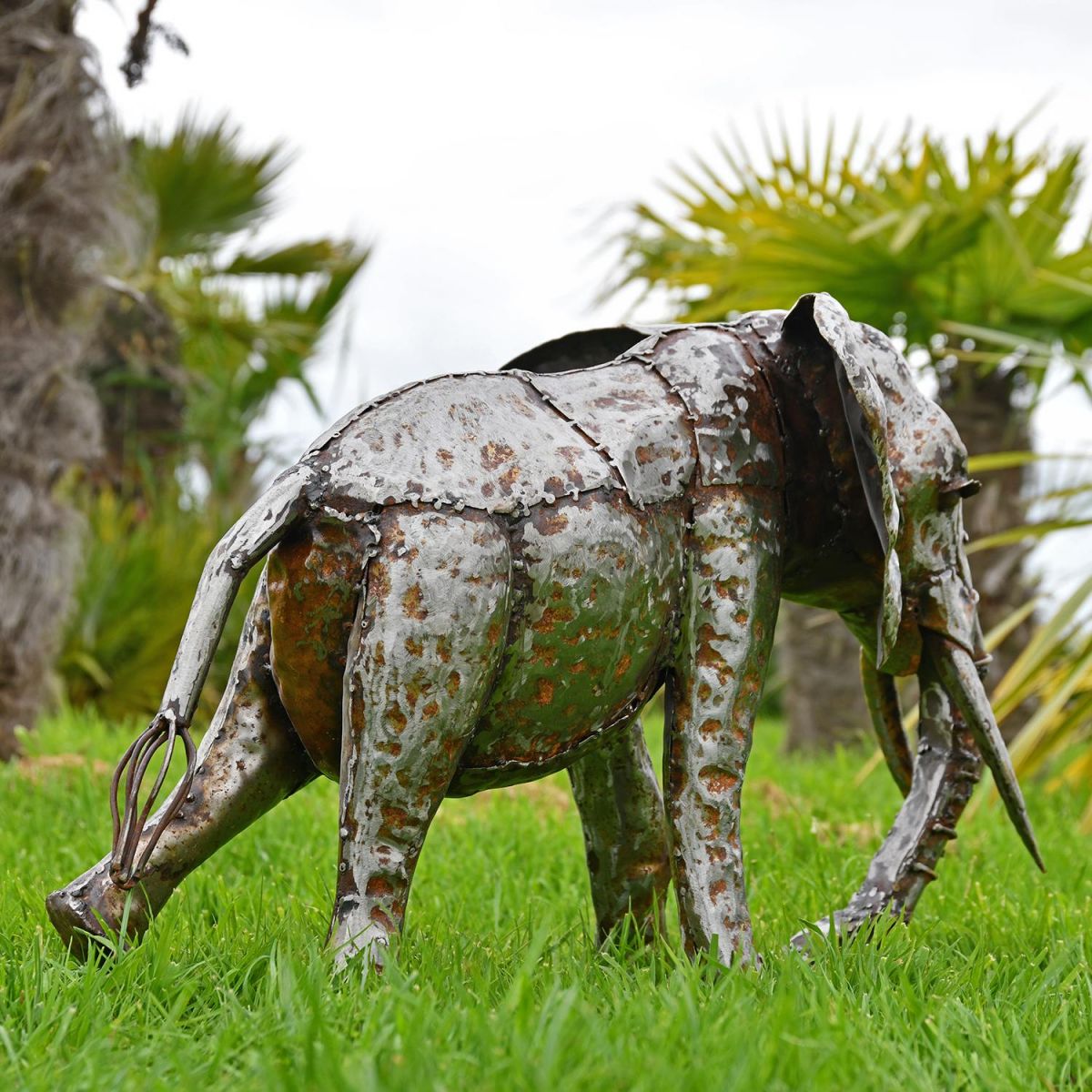 Side View of the Recycled Metal Elephant with Trunk Up