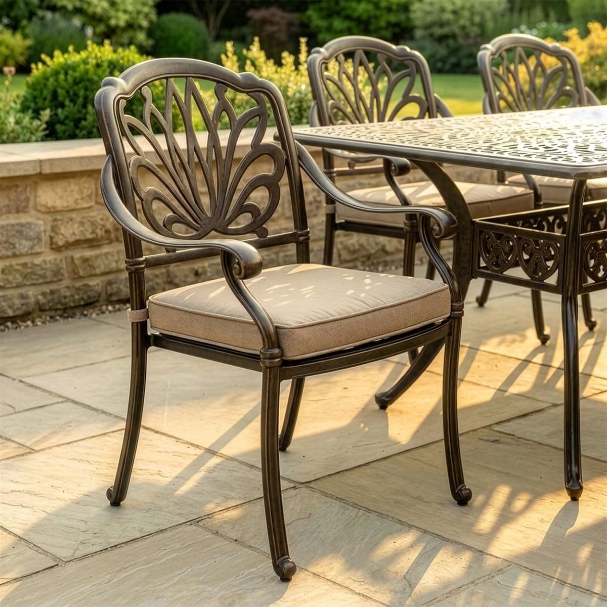 1The "Goliath" 8-Seater Outdoor Dining Set - Antique Bronze digital illiustration close up of chair