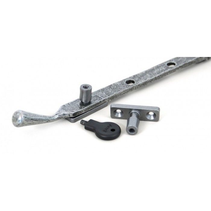 The Locking Pin Next To A Suitable Window Stay