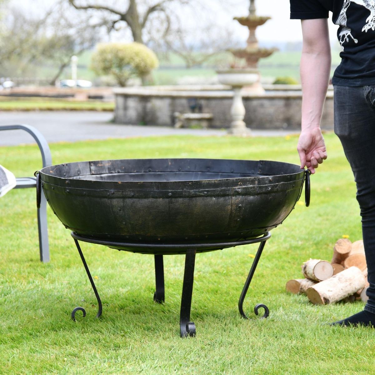 90cm Kadai Bowl with handles down with male for scale 