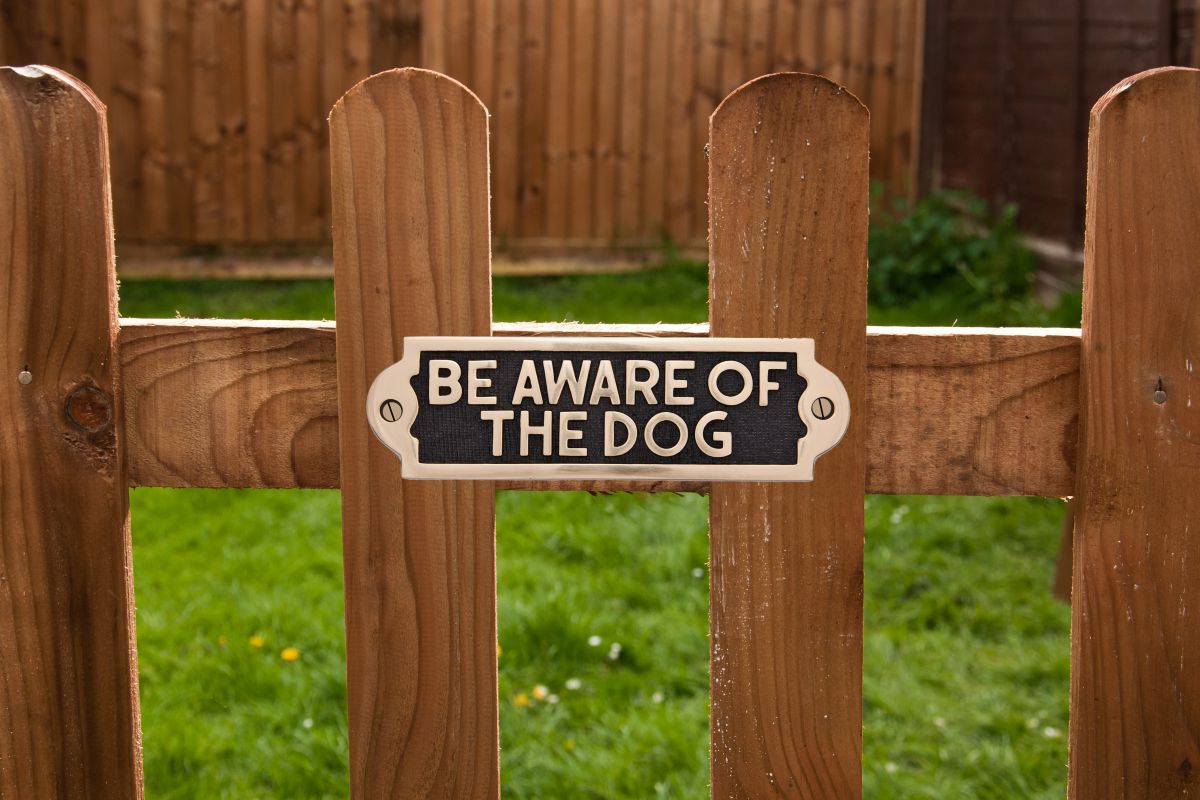 Be Aware of the Dog Gate Sign