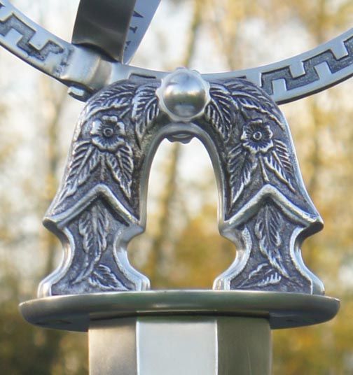 Close-up of the Detail on the Antique Silver Armillary with Column