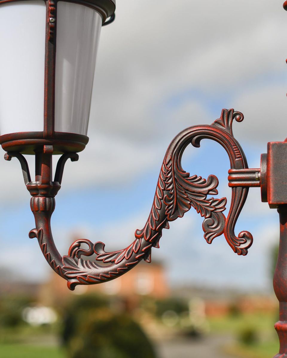 Close-up of the Ornate Brackets Supporting the Lanterns