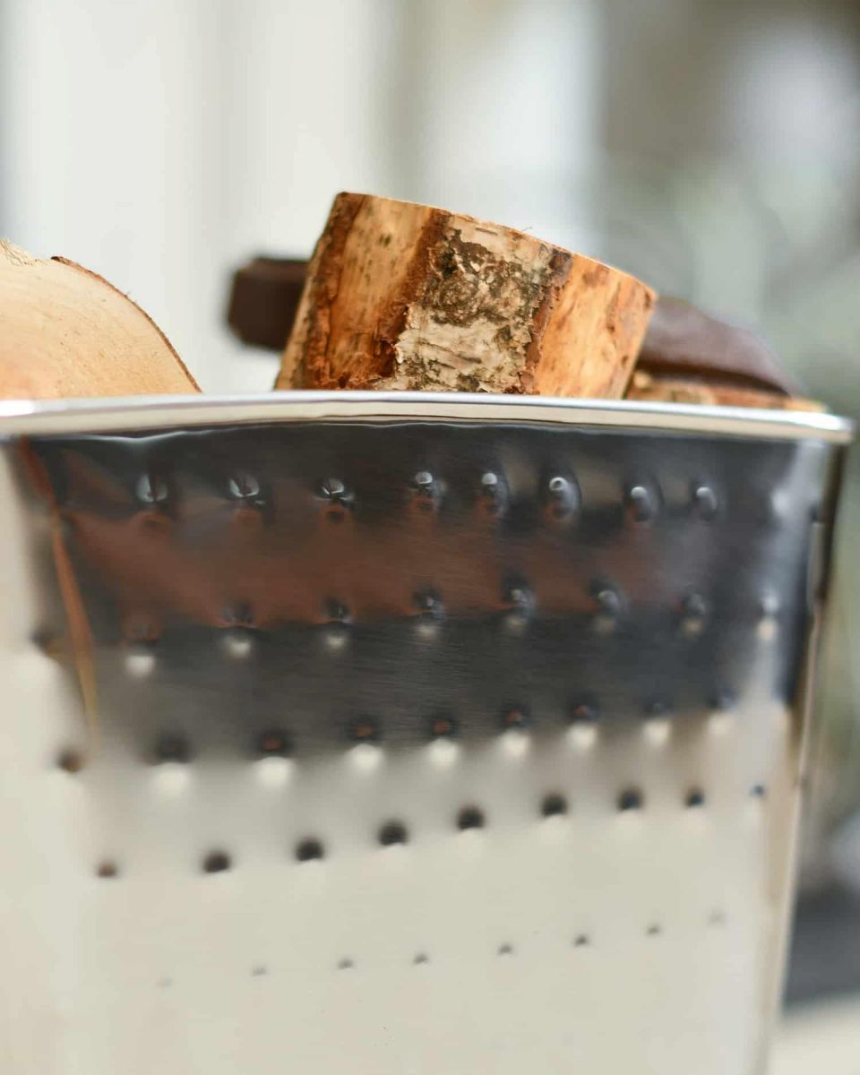 Close-up of "Keatley" Square Stainless Steel Log Holder Close-up of "Keatley" Square Stainless Steel Log Holder