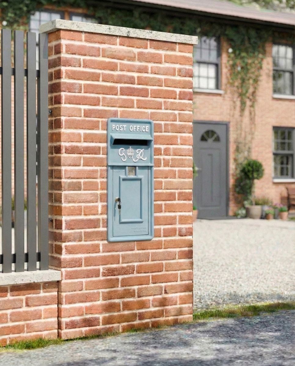 "Light Cove" King George Rex Post Box Front installed on a new home