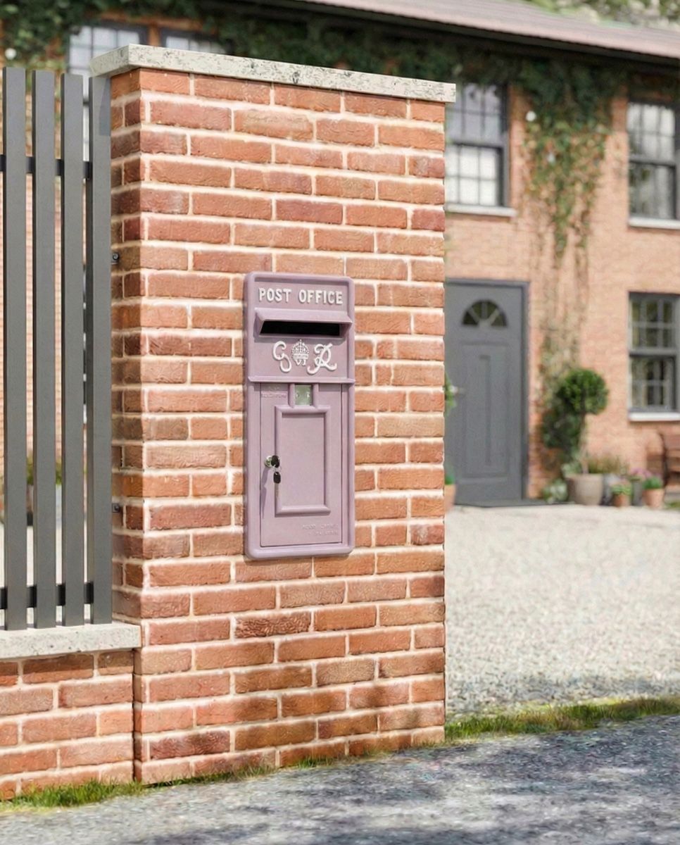 "Savannah Sunset" King George Rex Post Box Front installed on a new home