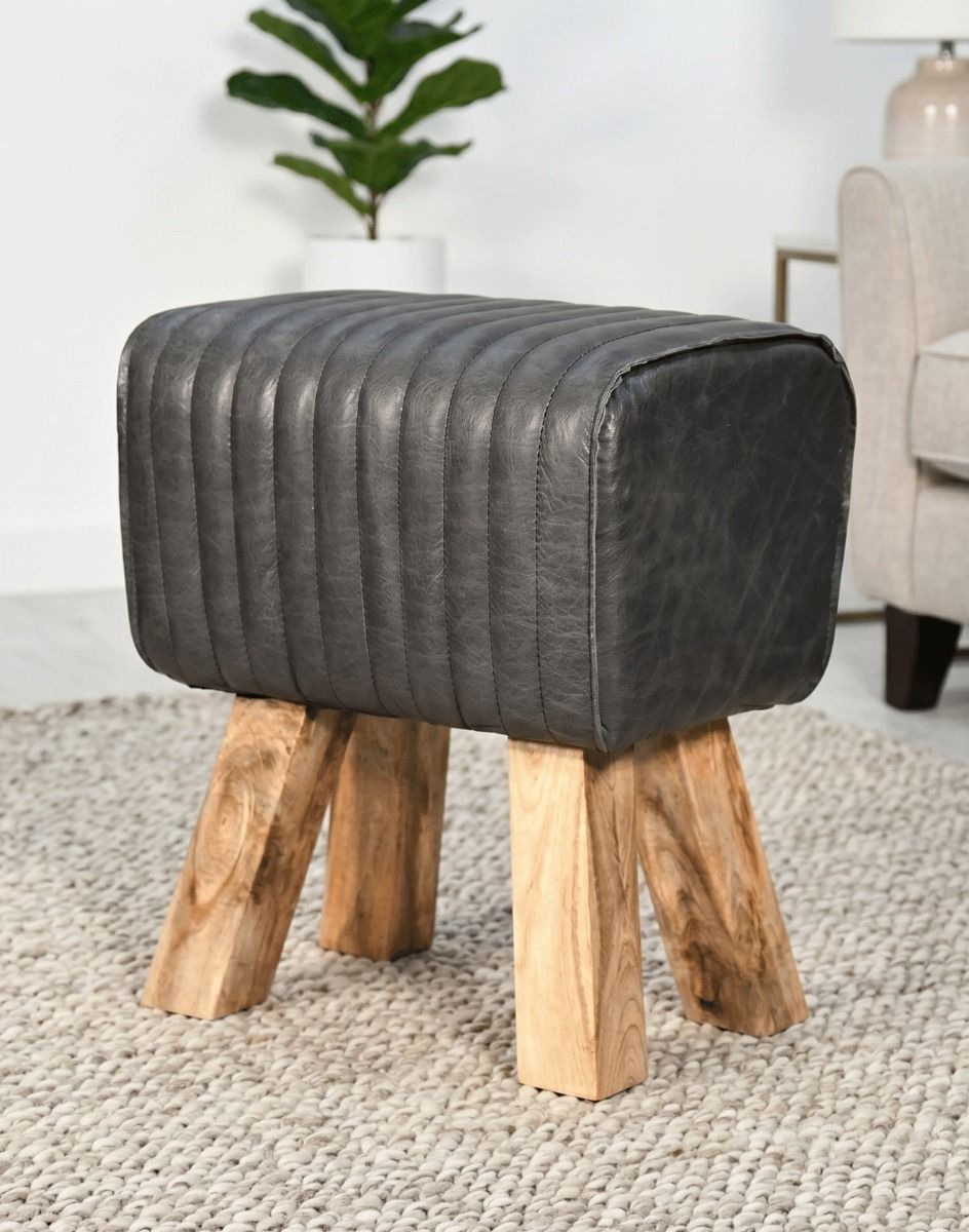 "The Orton" Mango Wood & Charcoal Leather Stool on a Cream Coloured Rug in a Modern Living Room - Digital Illustration