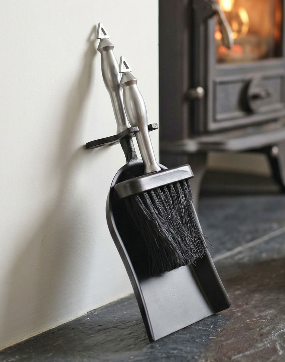 "The York" Brush and Pan Set next to a Modern Fireplace with a lit Log Burner Stove - Digital Illustration