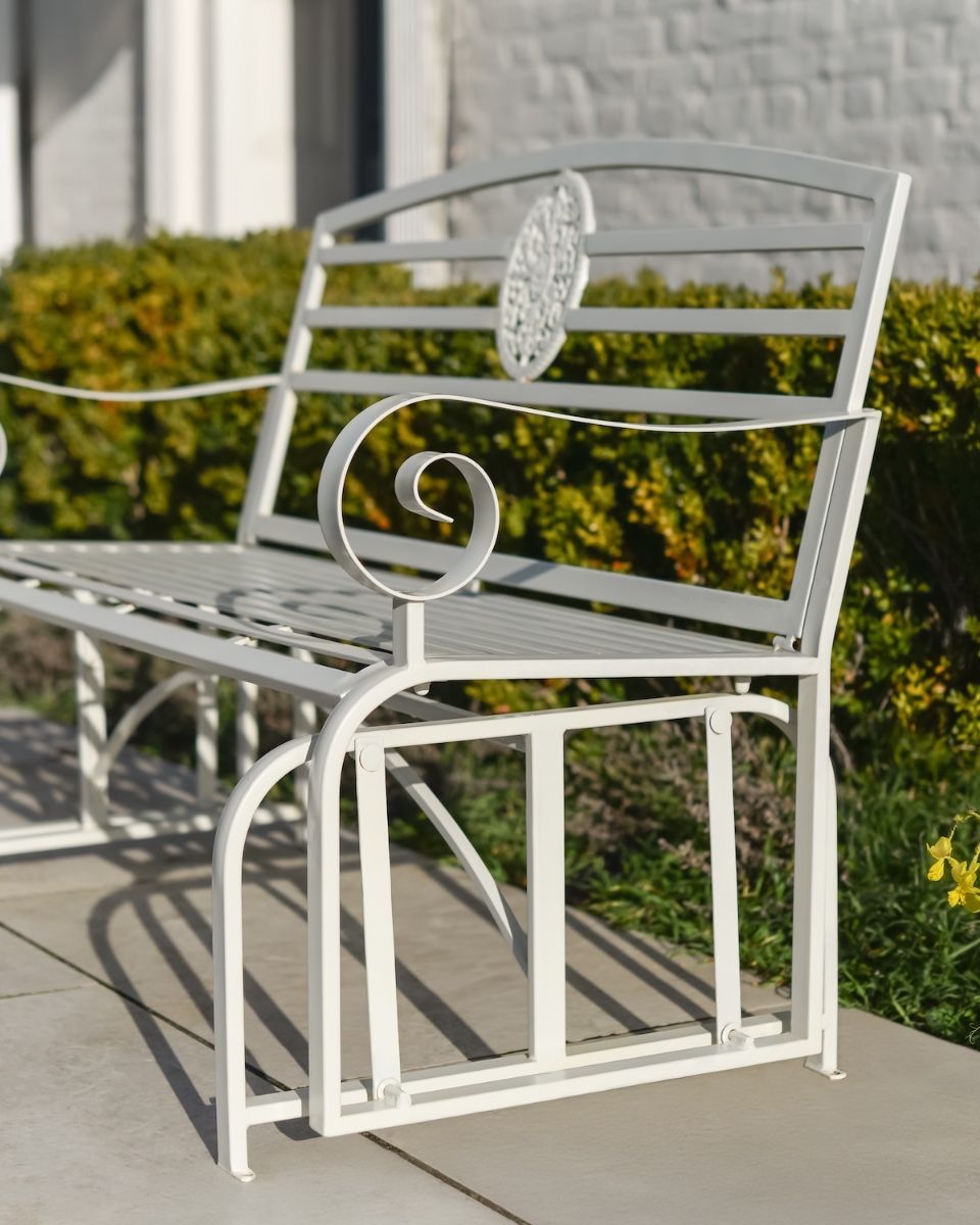 "Arcadia" Garden Rocking Bench Wrought Iron - Cream side view of bench
