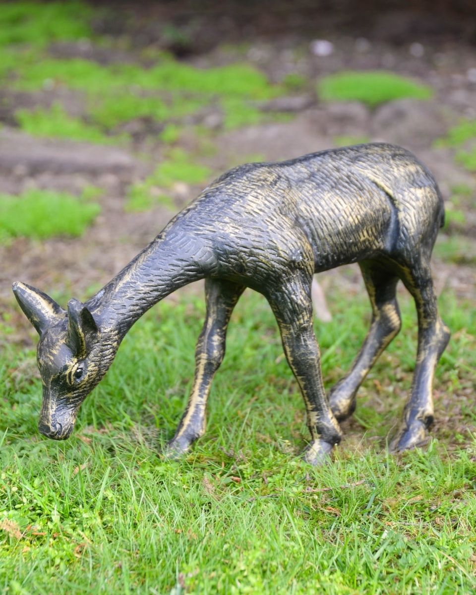 "Arwen" the Grazing Fawn Cast Aluminium Garden Sculpture on a Garden Lawn