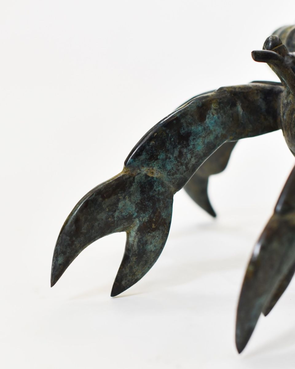 "Aurelian Nomad" Cast Brass Hermit Crab Ornament close up on pincer