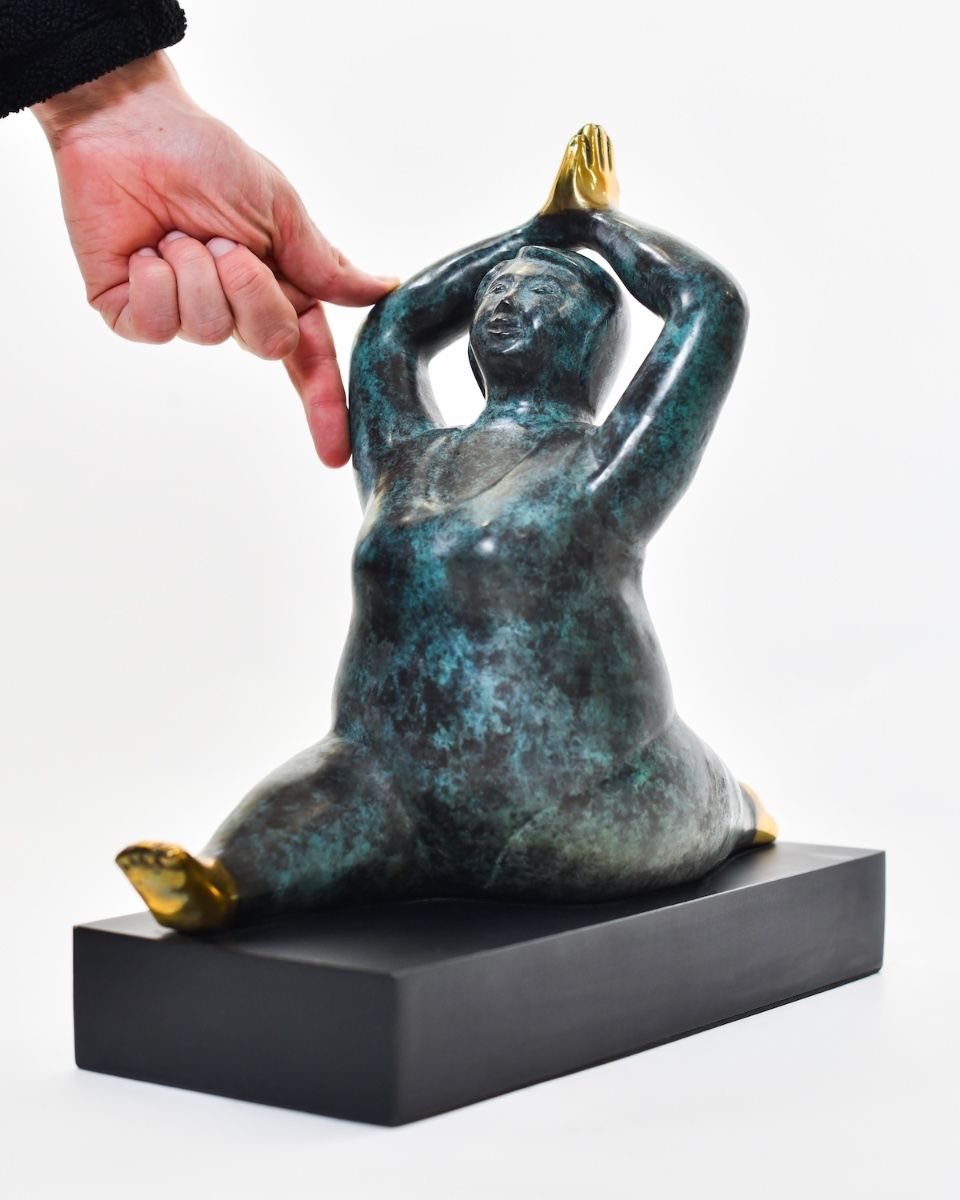 "Azure Asana" Female Yoga Sculpture in Cast Brass with hand in shot for scale